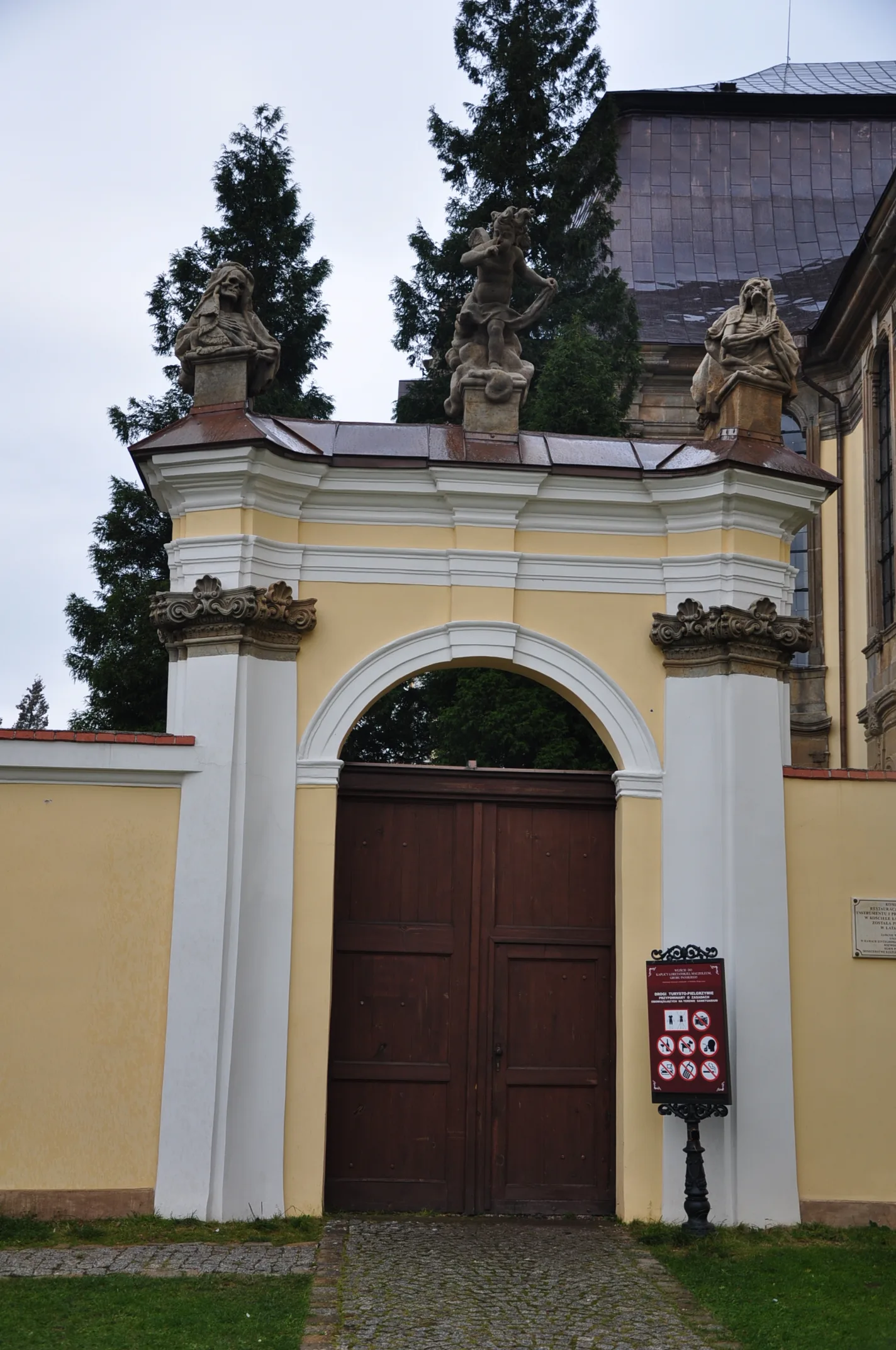 Entrance gate and walls of Krzeszów abbey cemetery